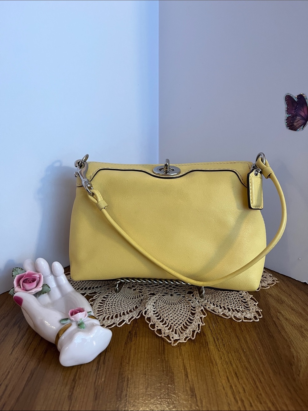 Coach Yellow Leather Wristlet Bag with turnlock closure